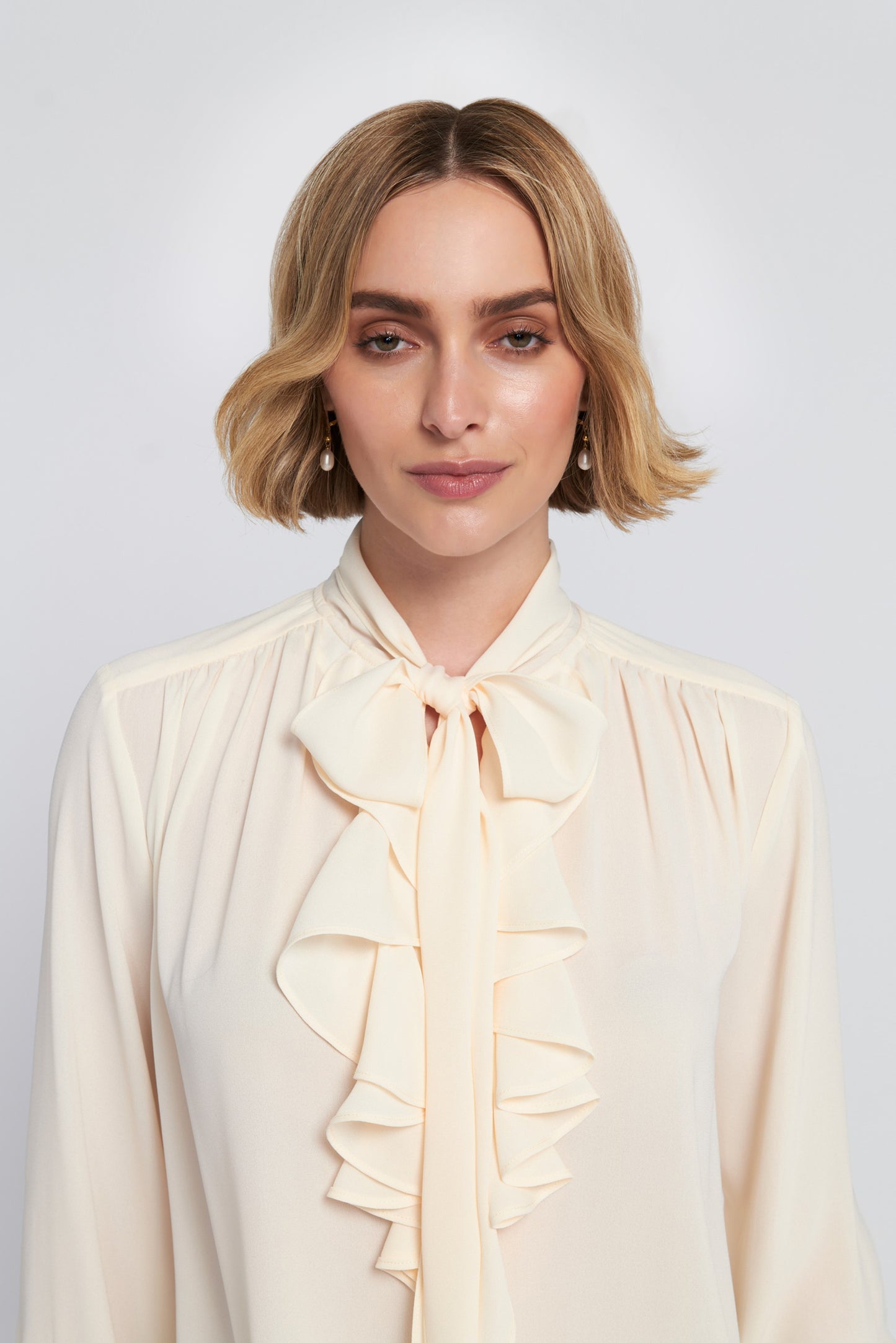 Flounce-Trimmed Tie-Neck Blouse