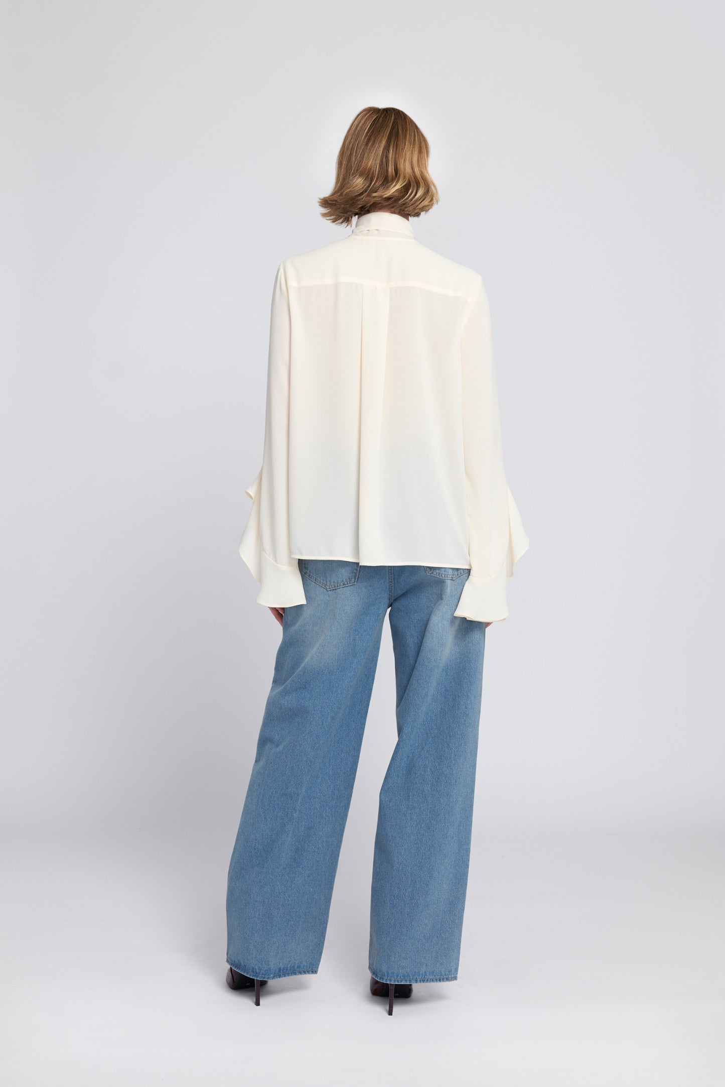 Flounce-Trimmed Tie-Neck Blouse